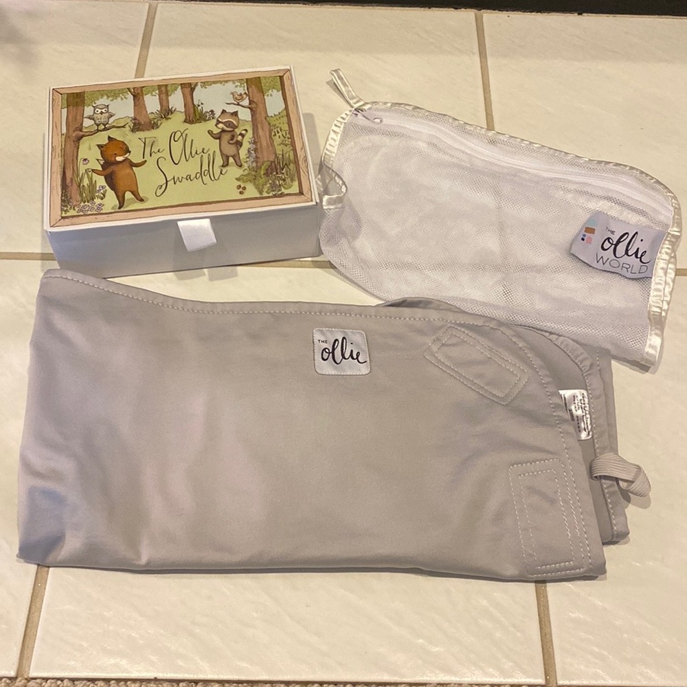 Like new Ollie swaddle! Amazing swaddle that just didn’t work for our baby.